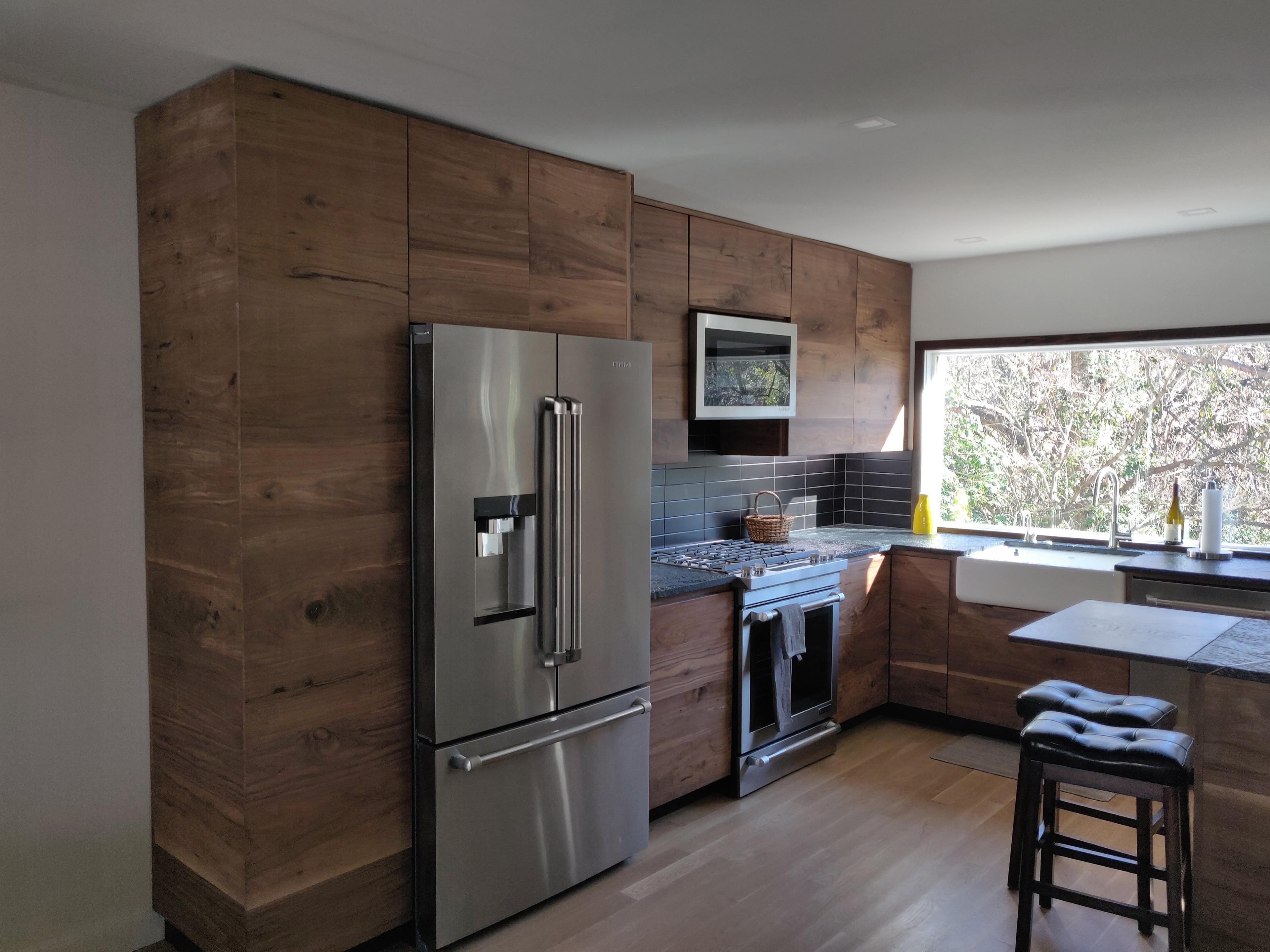 Modern walnut kitchen cabinetry